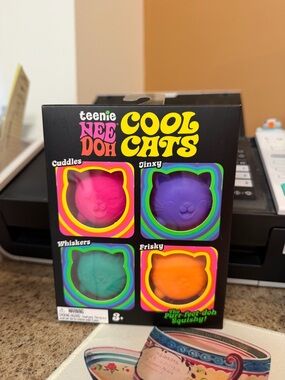 Teenie NeeDoh Cool Cats 4-Pack - Pink, Purple, Teal, Orange